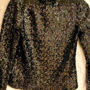Beautiful sexy sequin mock neck top. Perfect for New Year celebrations!